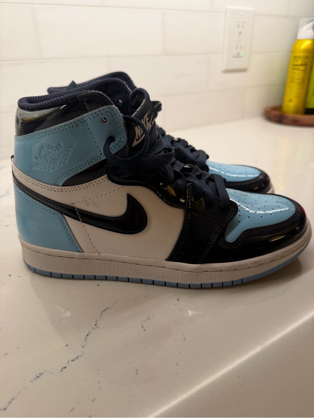 Nike Air Jordan 1 High Top in Light Blue, Black, and White